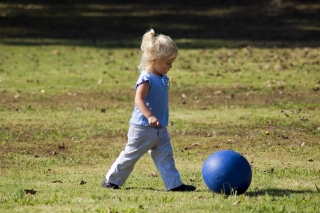 girl and blue ball